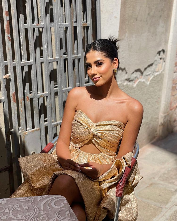 Ritika Khatnani in golden dress