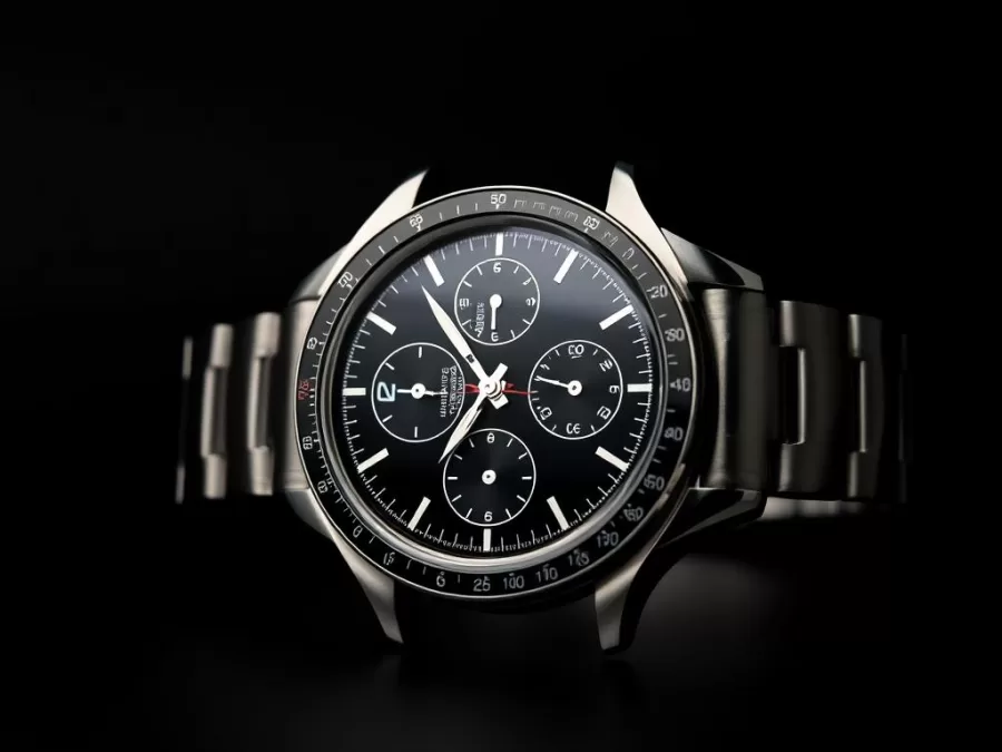 Omega Speedmaster Professional Moonwatch with black dial and tachymeter bezel