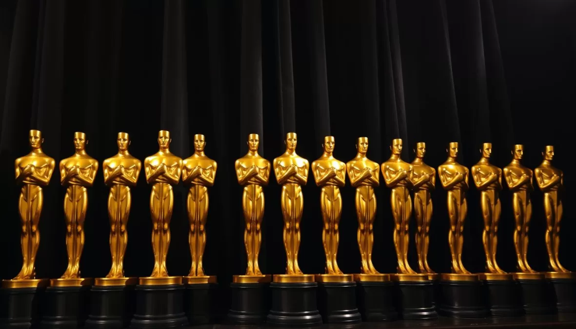 Oscar statuettes lined up representing the most awarded actors and actresses in Oscar history