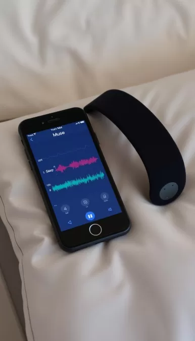 Muse S headband and app interface showing EEG brain activity monitoring during sleep
