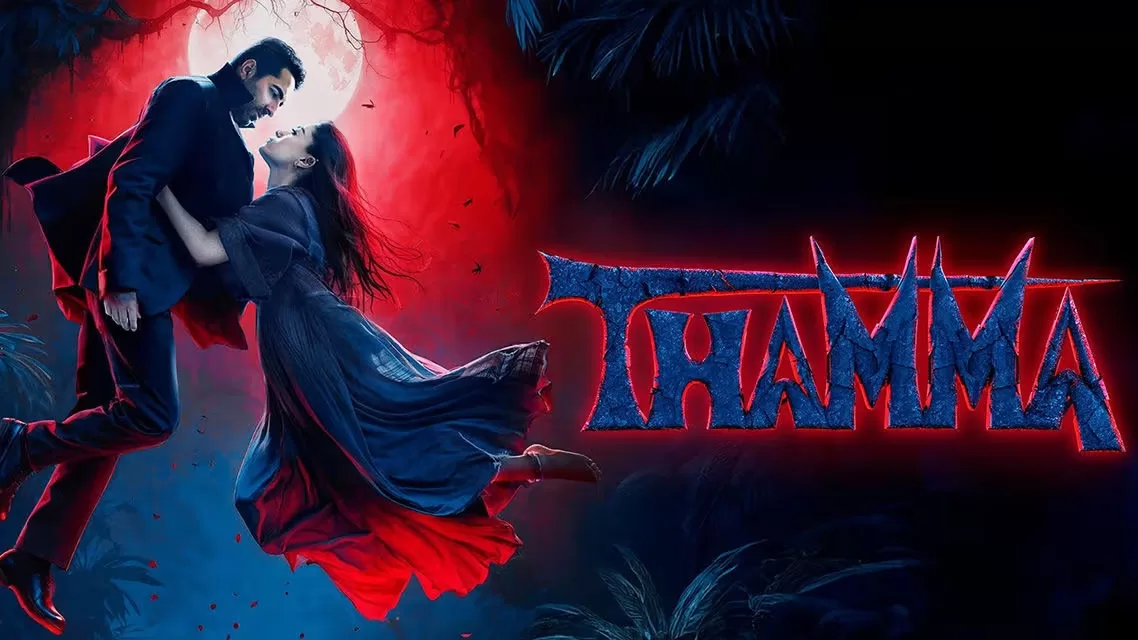 Thamma horror movie poster featuring Ayushmann Khurrana and Rashmika Mandanna in a supernatural setting