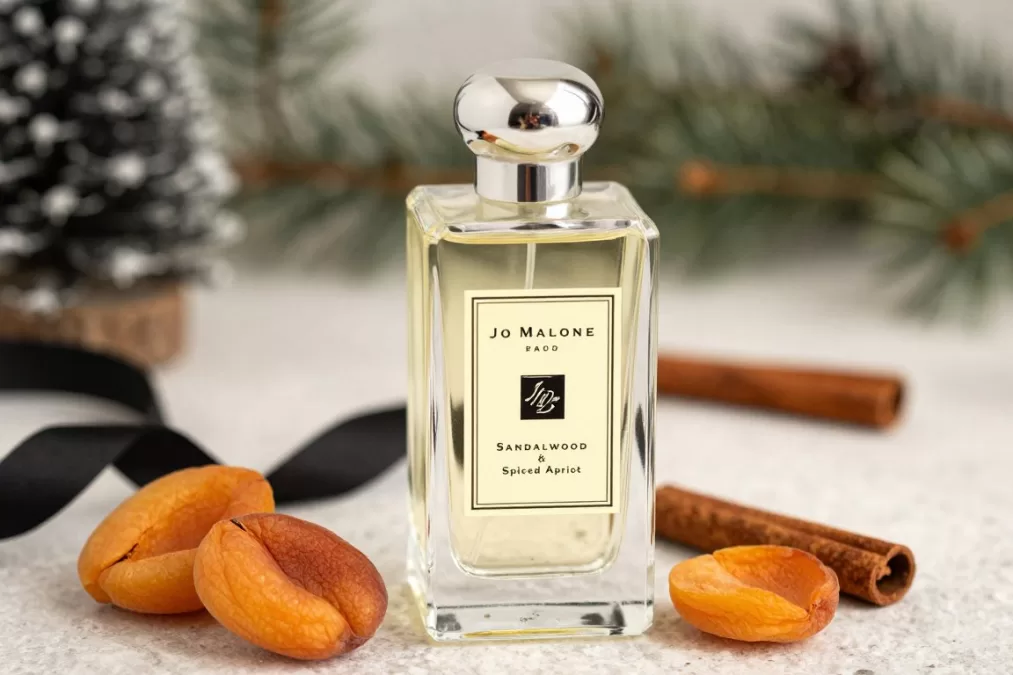 Jo Malone Sandalwood & Spiced Apricot Cologne bottle with signature Jo Malone design
