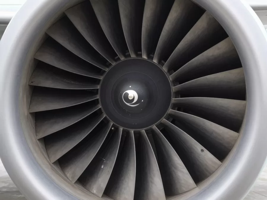 Aircraft engine damaged by bird strike with visible impact marks