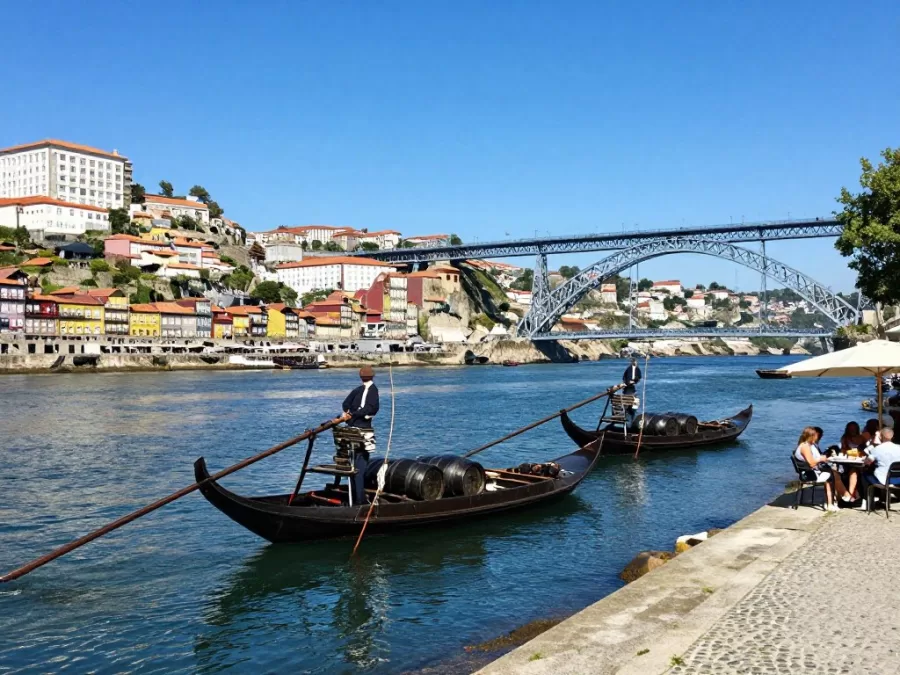Porto's colorful riverside buildings and wine cellars in summer sunshine