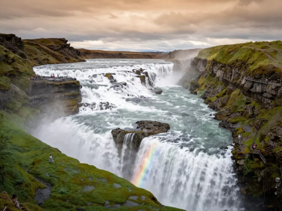 Gullfoss waterfall in Iceland with double cascade and rainbow during summer