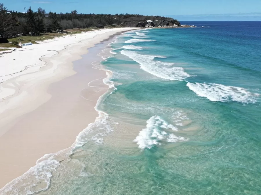 Hill Inlet Whitehaven Beach swirling sand water patterns aerial view