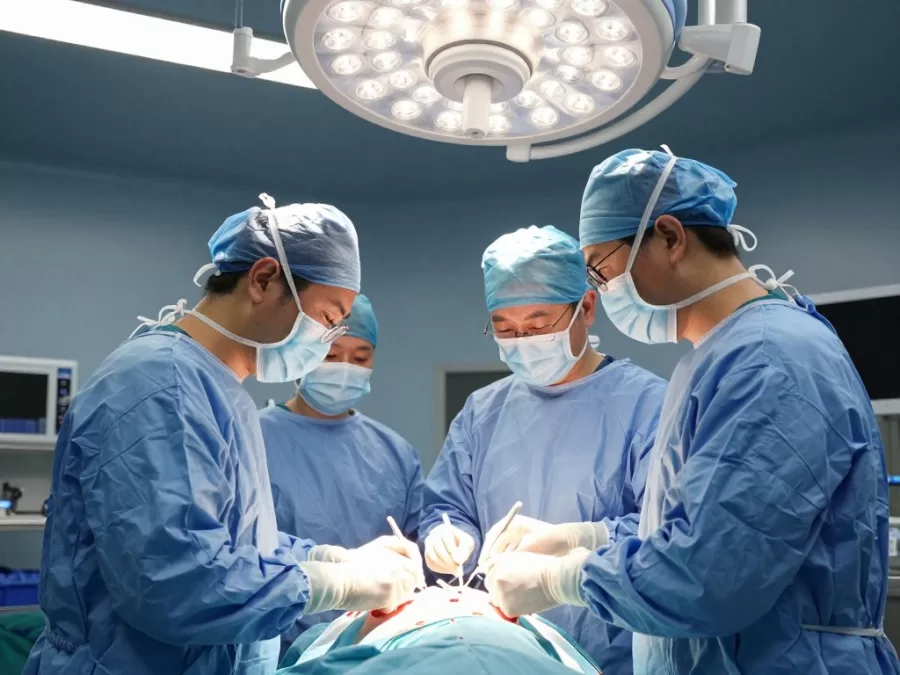 Surgical team performing advanced medical procedure