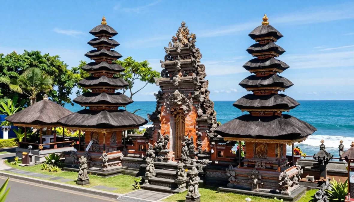 Traditional Balinese temple with multi-tiered pagodas surrounded by lush tropical jungle