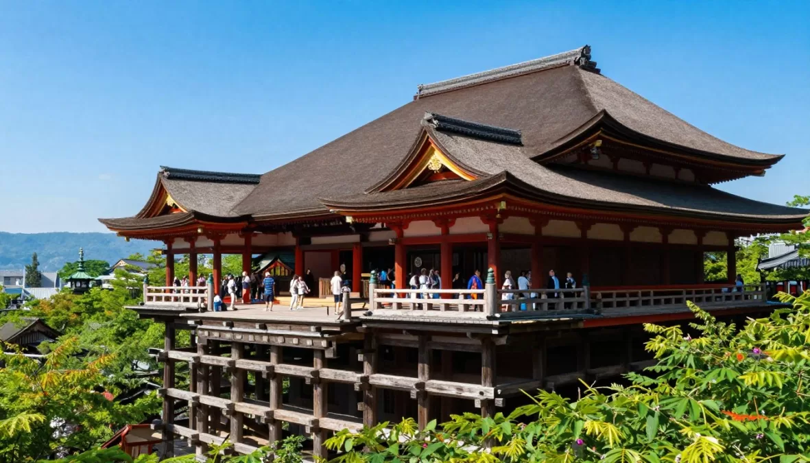 Traditional wooden temples and pagodas in Kyoto Japan surrounded by summer greenery