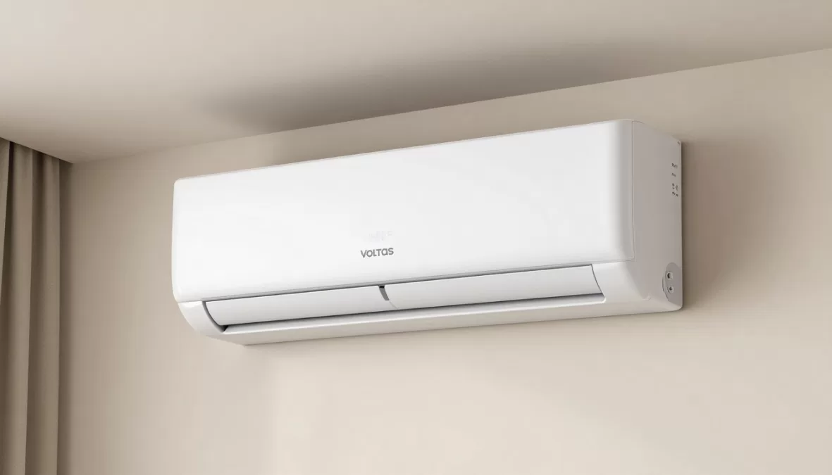Voltas 1.5 ton inverter split air conditioner mounted on white wall showing sleek design and digital display