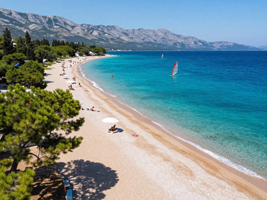 Zlatni Rat beach in Brac Croatia with distinctive golden pebble spit extending into blue sea