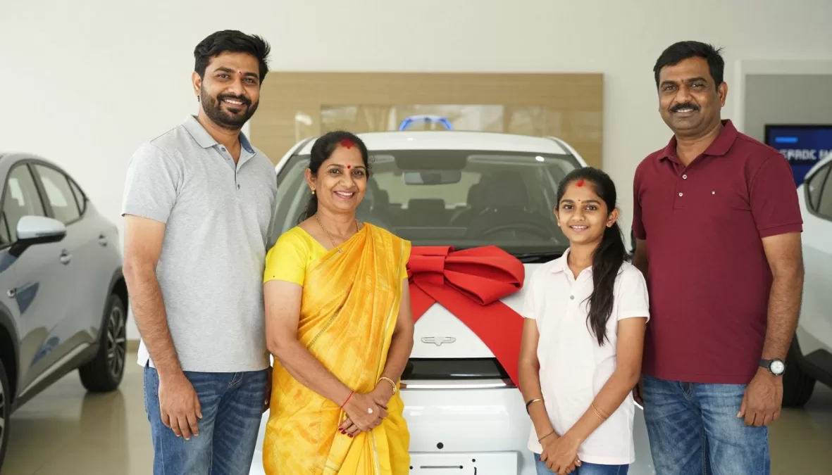 happy family with new electric vehicle