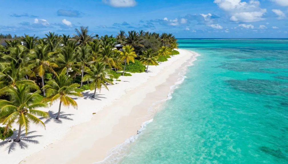 top 10 beaches in the world 2026 pristine turquoise waters white sand