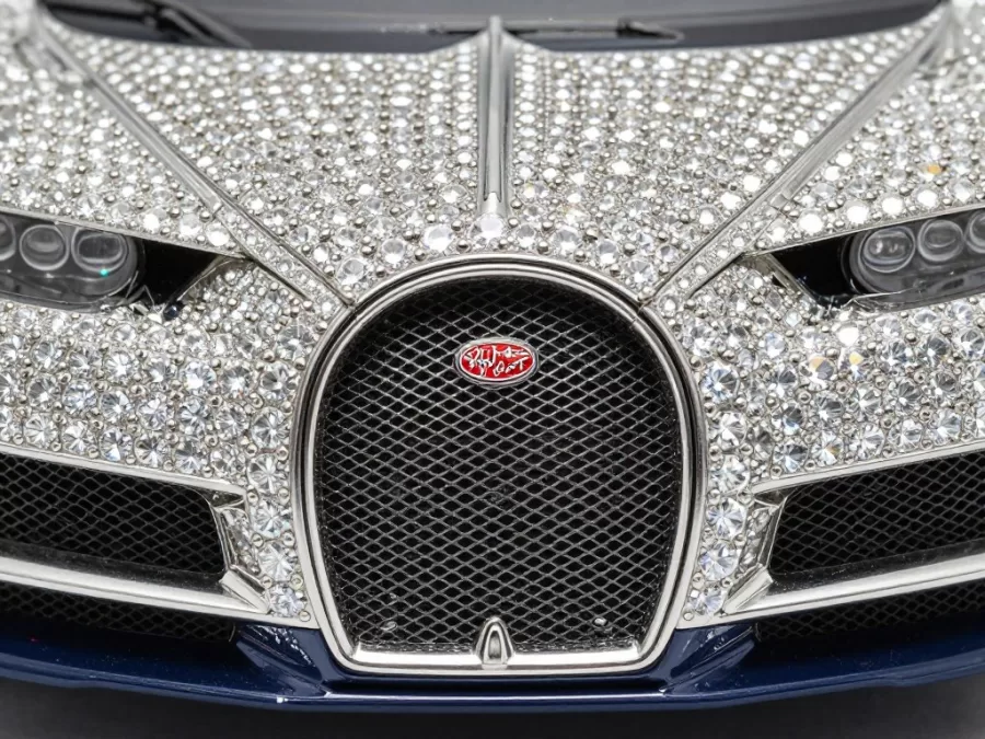 Close-up of diamond-set Bugatti grille on toy car showing intricate detail
