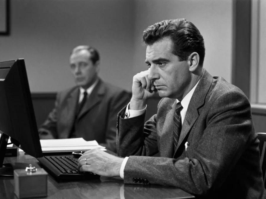 1960s office romance scene with melancholic undertones