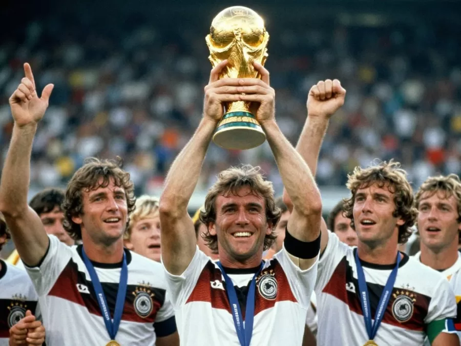 Franz Beckenbauer lifting World Cup trophy as captain