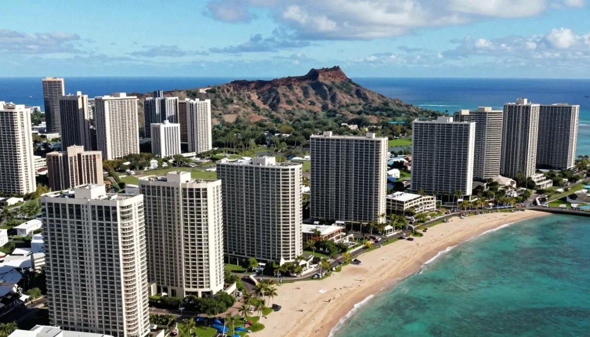 Honolulu expensive coastal housing with Diamond Head in background