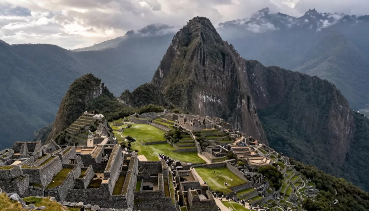 Machu Picchu ruins with mountain backdrop and morning mist