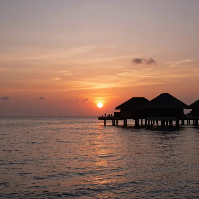 Maldives sunset over ocean horizon