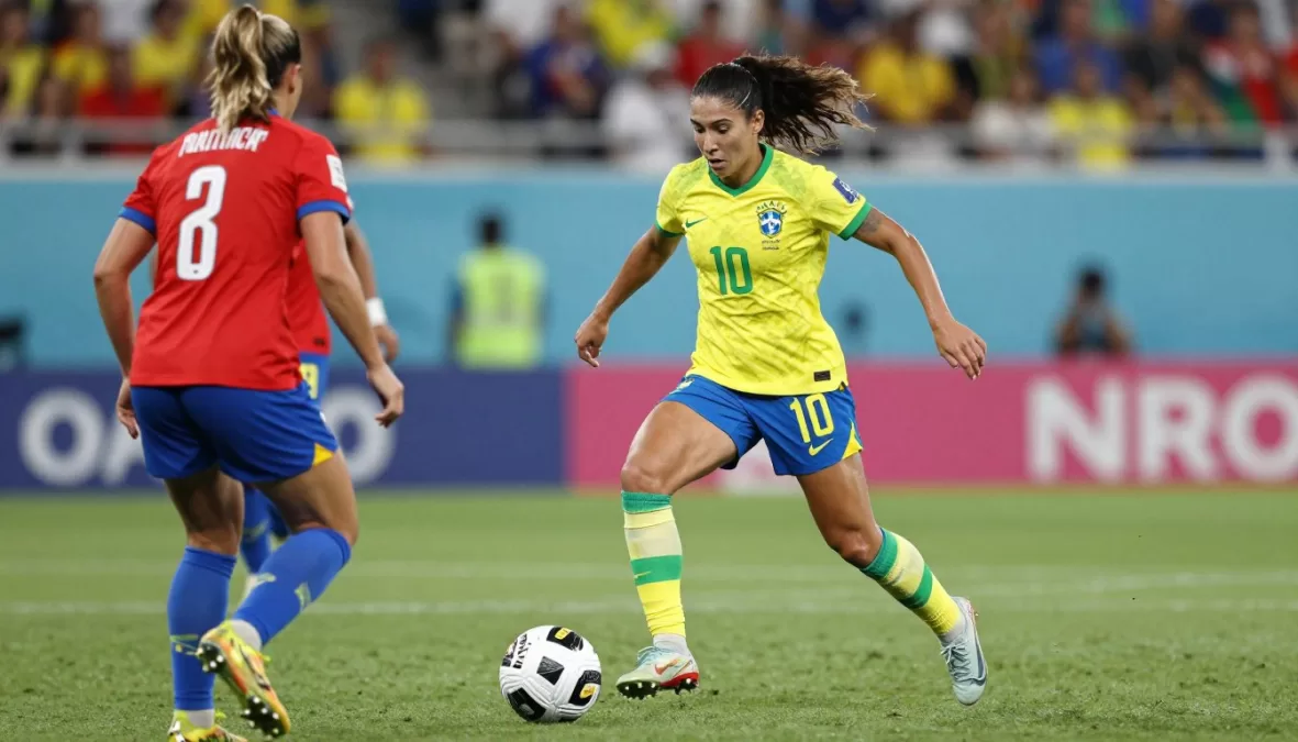 Marta dribbling for Brazil women's team