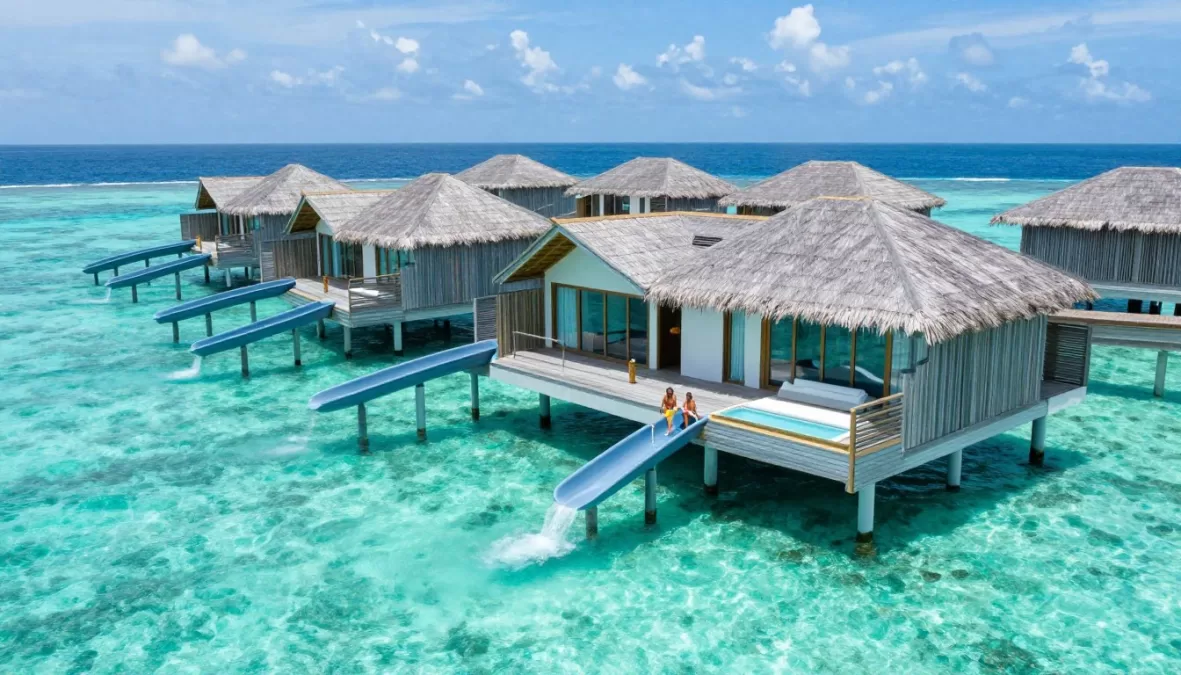 Soneva Jani overwater villas with retractable roofs and water slides in Maldives