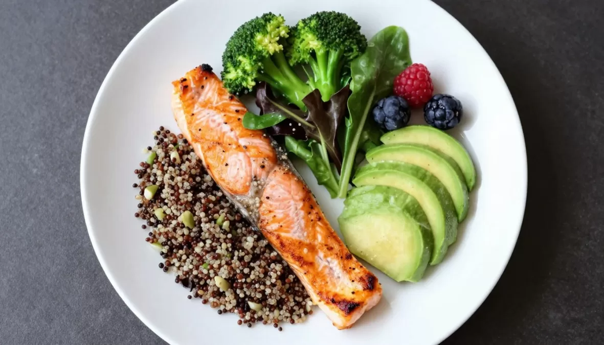 balanced meal plate featuring multiple healthiest foods including salmon, vegetables, whole grains and avocado