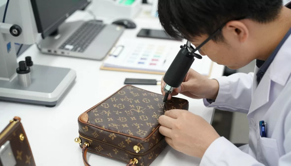 luxury brand authentication process showing genuine designer item details