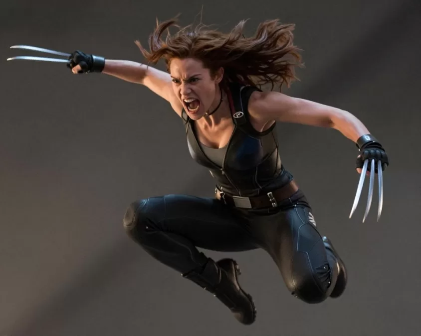 Dafne Keen as X-23 Laura in action with her claws extended