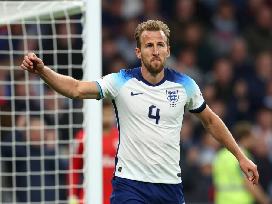 Harry Kane shooting goal for England during world cup qualification game