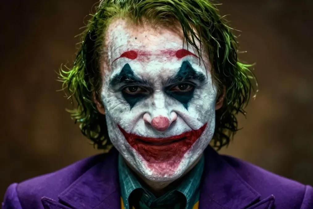 Heath Ledger as the Joker with his iconic makeup and sinister smile