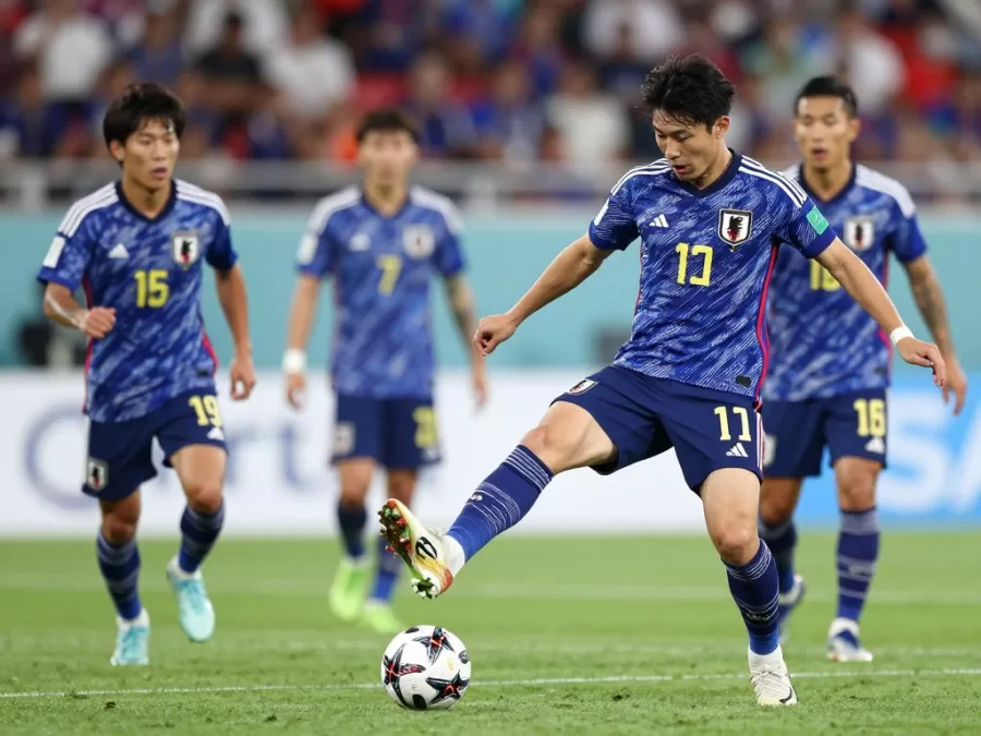 Japan national soccer team players in blue jerseys during world cup