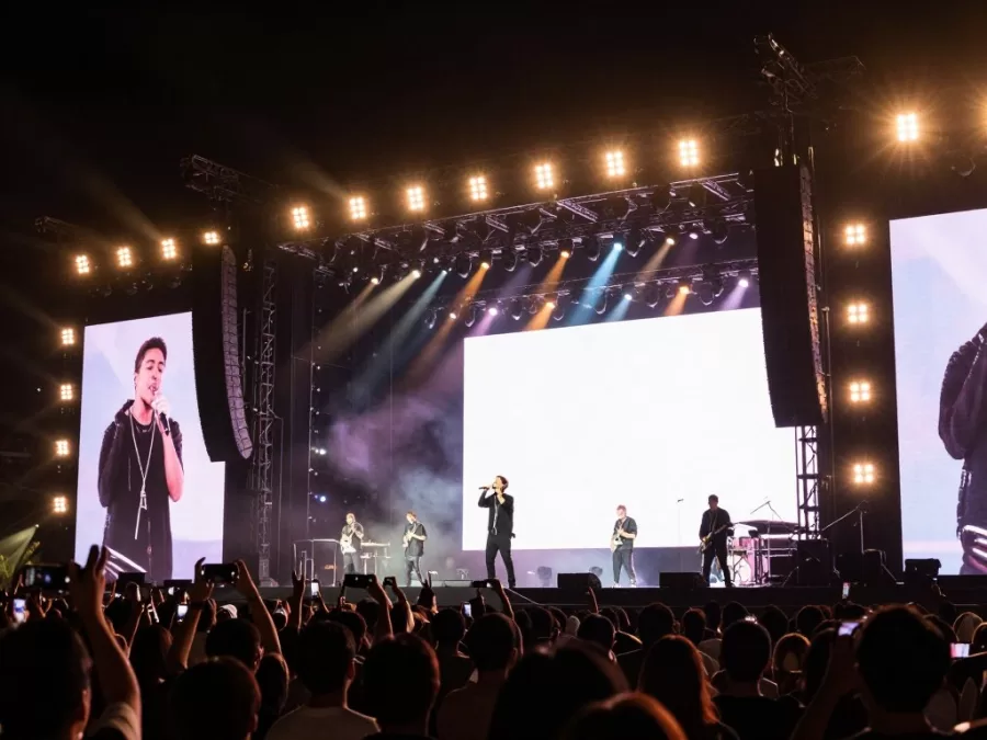 Live Nation entertainment company artists performing on stage with professional lighting