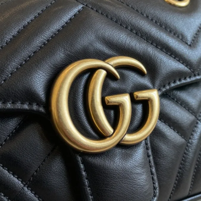 Close-up of Gucci leather texture and hardware detail