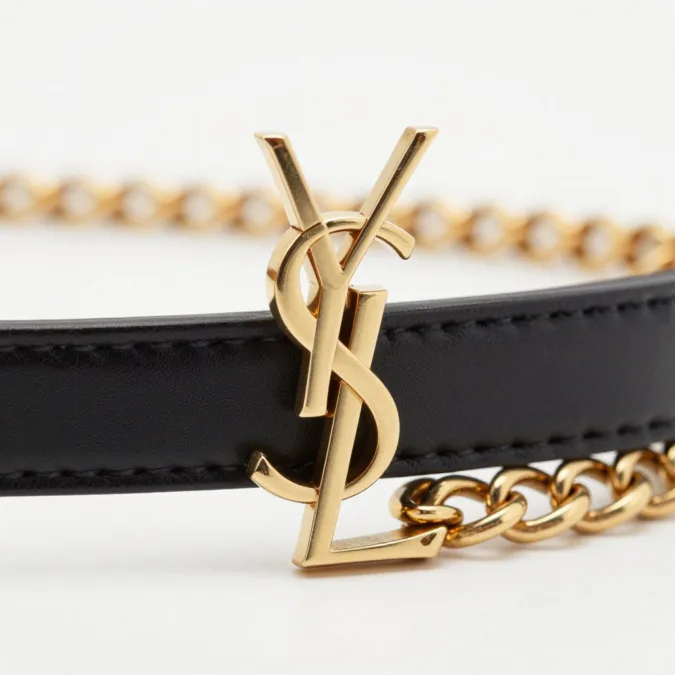 Close-up of Saint Laurent YSL logo hardware and chain detail
