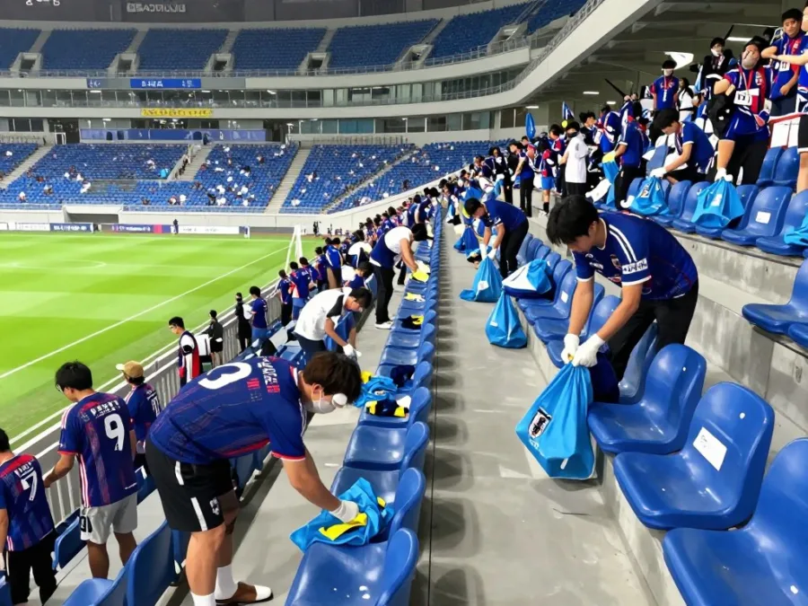 Japan soccer supporters cleaning a stadium after a match