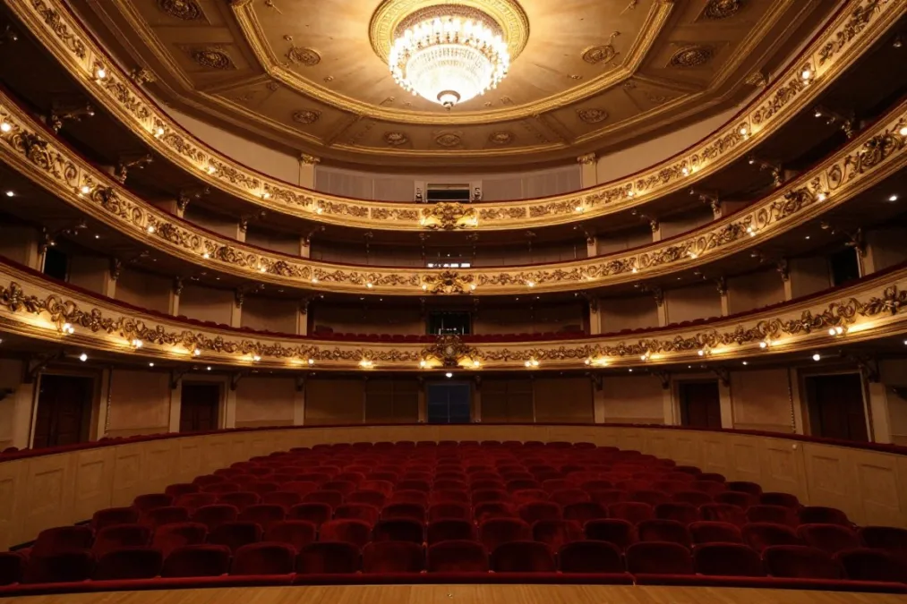Concert hall stage with red velvet seats Concert hall stage with red velvet seats