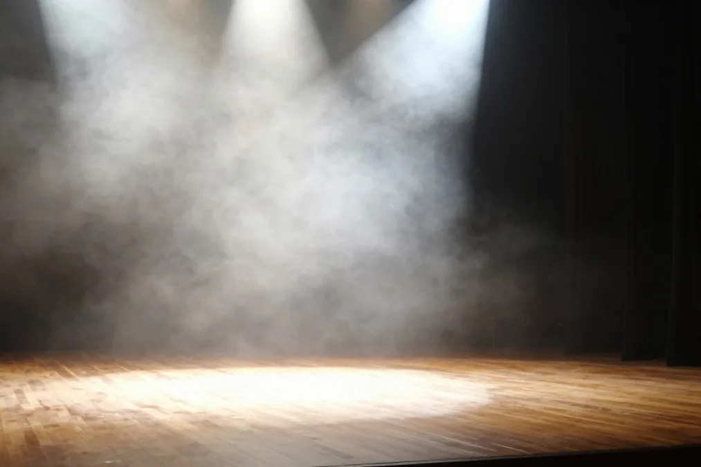 Concert spotlight cutting through stage haze Concert spotlight cutting through stage haze