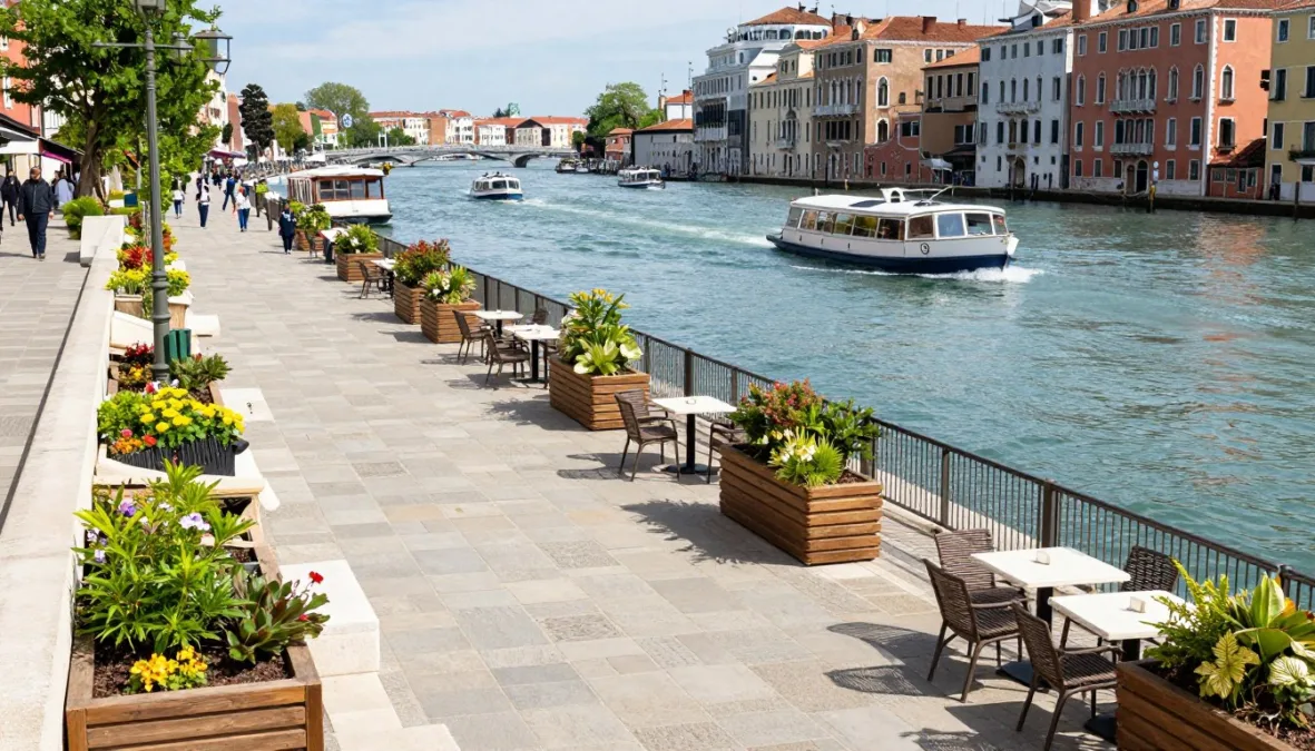 Pedestrian promenade along an urban river with outdoor seating and boats Pedestrian promenade along an urban river with outdoor seating and boats